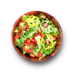 fresh vegetable salad in the bowl on isolated white background - top view
