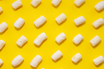 Sweet corn sticks pattern background on yellow background