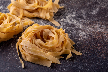 Homemade italian pasta - tagliatelle. Close-up.