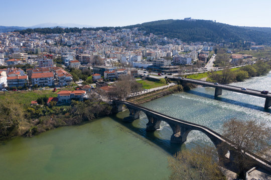 The Bridge of Arta is an old stone bridge that crosses the Arachthos river in the west of the city of Arta in Greece.