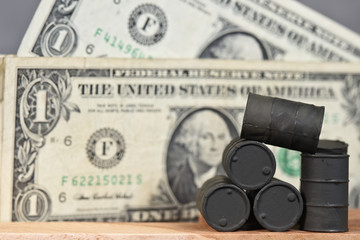 argent dollar monnaie billet banque affaires business benefice hausse prix petrole bidon baril