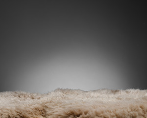 brown sheepskin texture on gray background