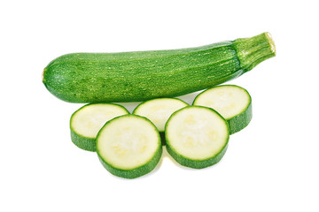 fresh green zucchini with slice isolated on white background