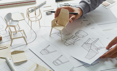Designer sketching drawing design development product plan draft chair armchair Wingback Interior...