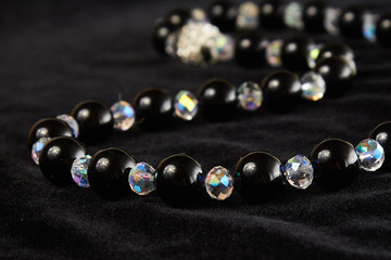 beads from Mallorca semiprecious stone on black velor. close up