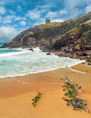 Beach of Ubiarco in northern Spain in a sunny day