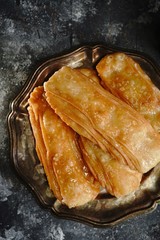 Homemade Indian sweet khaja /chirote or Madakku san, selective focus