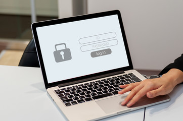Fototapeta na wymiar データ保護とインターネットセキュリティのイメージ、ユーザーがコンピューターにIDとログインパスワードを入力して個人情報を保護