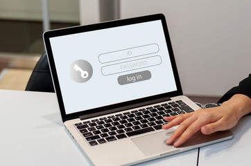 データ保護とインターネットセキュリティのイメージ、ユーザーがコンピューターにIDとログインパスワードを入力して個人情報を保護