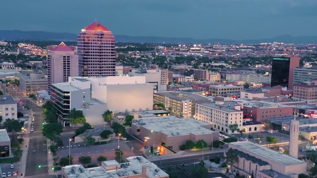 Albuquerque, New Mexico, USA. Aerial flying over the downtown city CBD at night