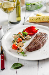 Beef steak with vegetables and mustard sauce