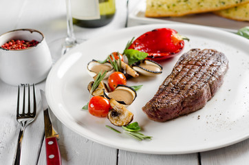 Beef steak with vegetables and mustard sauce