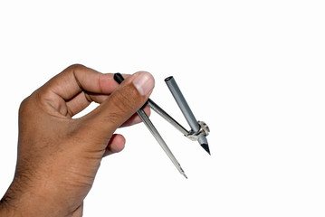 Person holding a pencil compass attached to a silver colored wood pencil