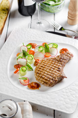Pork entrecote with fresh vegetables