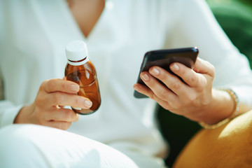 woman buying pharma in house in sunny day