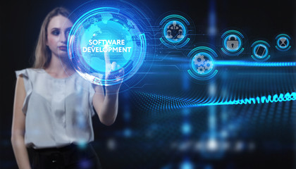 Fototapeta premium Business, Technology, Internet and network concept. Young businessman working on a virtual screen of the future and sees the inscription: Software development