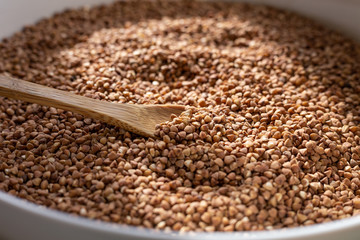 buckwheat in a wooden spoon
