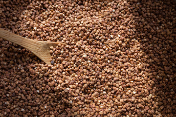 buckwheat on a wooden spoon