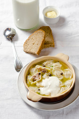 Dumplings in meat broth. Traditional meat dish of Russian cuisine