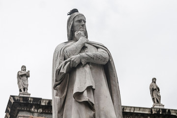 A thoughtful monument with a bird historical part of Verona, Veneto, Italy,