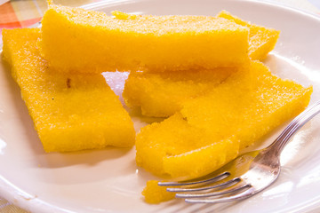 hot and steaming fried corn polenta ready for your meal