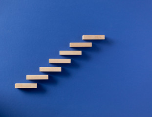 wooden stair made by wooden cube block with free copyspace for your text
