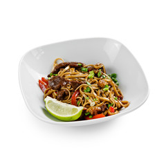 Fried udon noodles in a wok with beef, bell pepper and broccoli. Traditional asian food. Isolated on a white background.