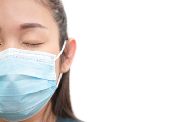 The image face  of a young Asian woman wearing a mask to prevent germs, toxic fumes, and dust. Prevention of bacterial infection in the air in a white background