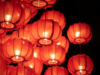Red lanterns in the darkness, Japanese or Chinese lanterns. Close up and Selective focus.