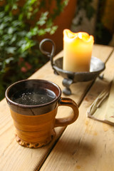 mulled wine drink with a candle on the table. authentic romantic evening