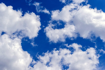 Fototapeta premium Background of blue sunny bright summer sky.
