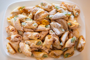 Cornulețe. A traditional Romania dessert that is a small croissant stuffed with jam or Turkish delight sprinkled with icing sugar