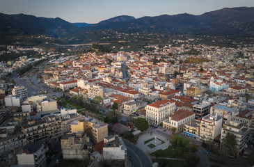 Fototapeta na wymiar Aerial view of the wonderful old town of Kalamata City and the historical Castle at Sunset. Kalamata has become a top tourist attraction located in Messinia, Peloponnese, Greece.