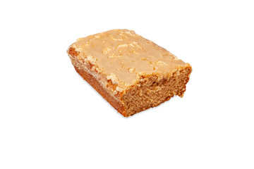 half of Baileys Crumb Cake with glaze for brunch or dessert isolated on white background