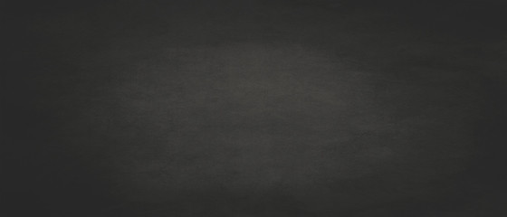 Black background with old vintage paper chalkboard texture