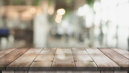 3D Rendering, Wooden top table with bokeh light effect and blur restaurant on background, blur...