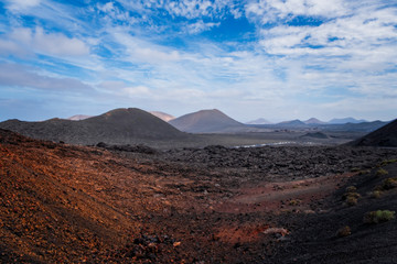 Amazing volcanic landscape of Lanzarote island, Timanfaya national park, Spain. October 2019