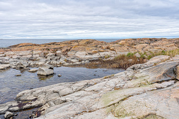 Rocky shore of the Baltic Sea (Ostersjon). Photo of Scandinavian nature. Swedish coast.