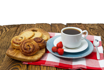 cup of coffee and bakery on old wooden table