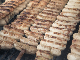 Fresh bananas skewered on a grill and ready for sale on the street of food. Bangkok, Thailand.