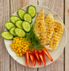 Grilled chicken fillet with vegetables and dill