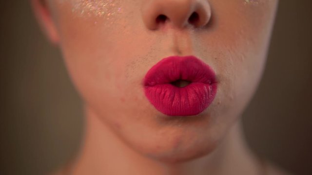 Pink lipstick, homosexual man with bright makeup, transvestite, travesti diva