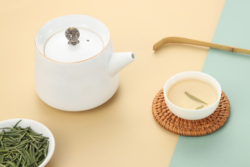 chinese green tea on color background

