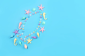 Silhouette of fish from sea animals on a blue background. Abstract image. World Ocean Day, World Environment Day. Flat lay, top view.