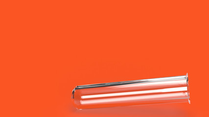 Glass tube on red background