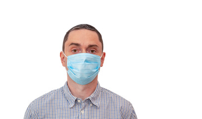 Handsome business man wearing medical face mask isolated on white background. Personal protection. Coronavirus COVID-19