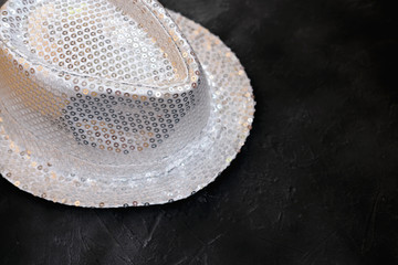 Silver sequin party hat. shiny party hat. party time concept. holiday selebration or night club...