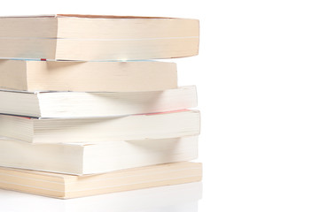 stacked books on a white background