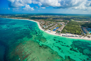 Fototapeta na wymiar Punta Cana Bavaro beach aerial drone view on tropical coastline in Cortecito area, Dominican republic 