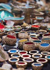 Close-up ceramic painted cups, dishes at Edinburgh market